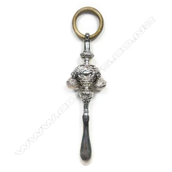A silver baby rattle,
