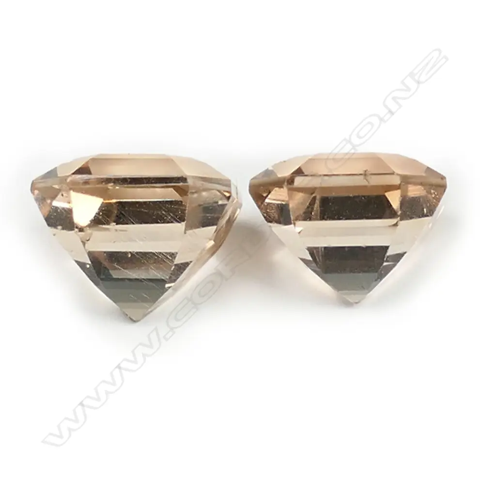 A pair of imperial topaz gemstones, Image 1++