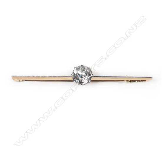 An estate 18ct gold, platinum and diamond bar brooch,