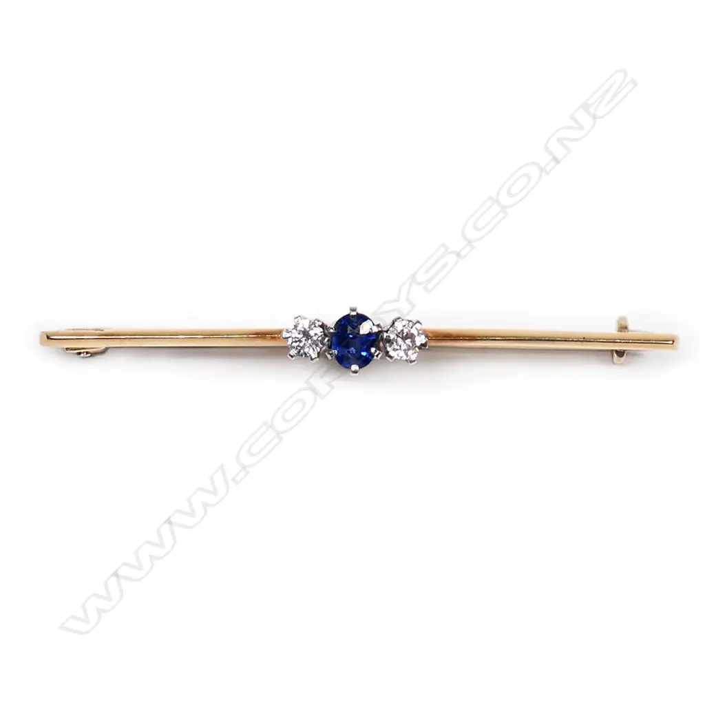 An estate 18ct sapphire and diamond bar brooch, Image 1++