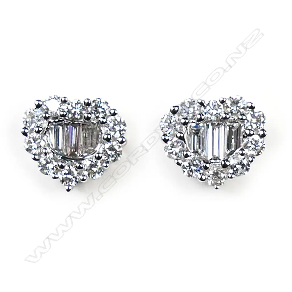 A pair of 18ct white gold and diamond cluster earrings, Image 1++