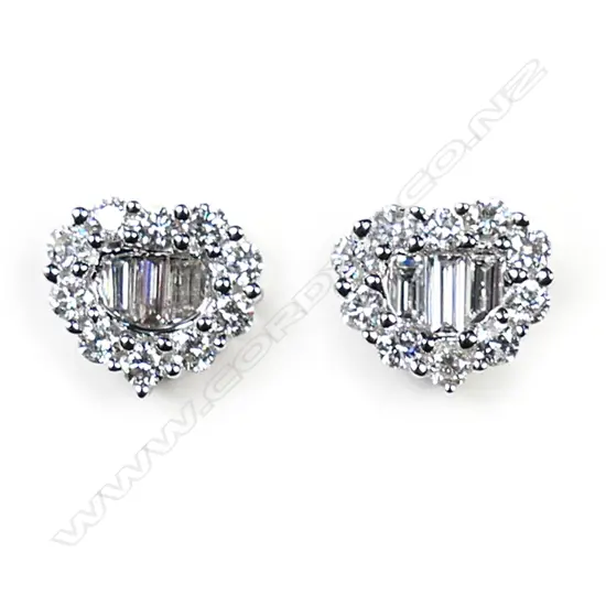 A pair of 18ct white gold and diamond cluster earrings,