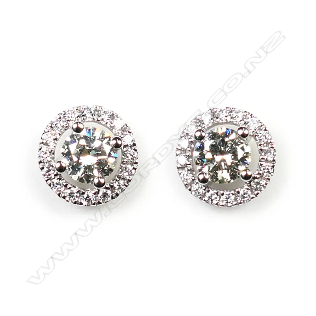 pair of 18ct white gold and diamond cluster earrings. Image 1++