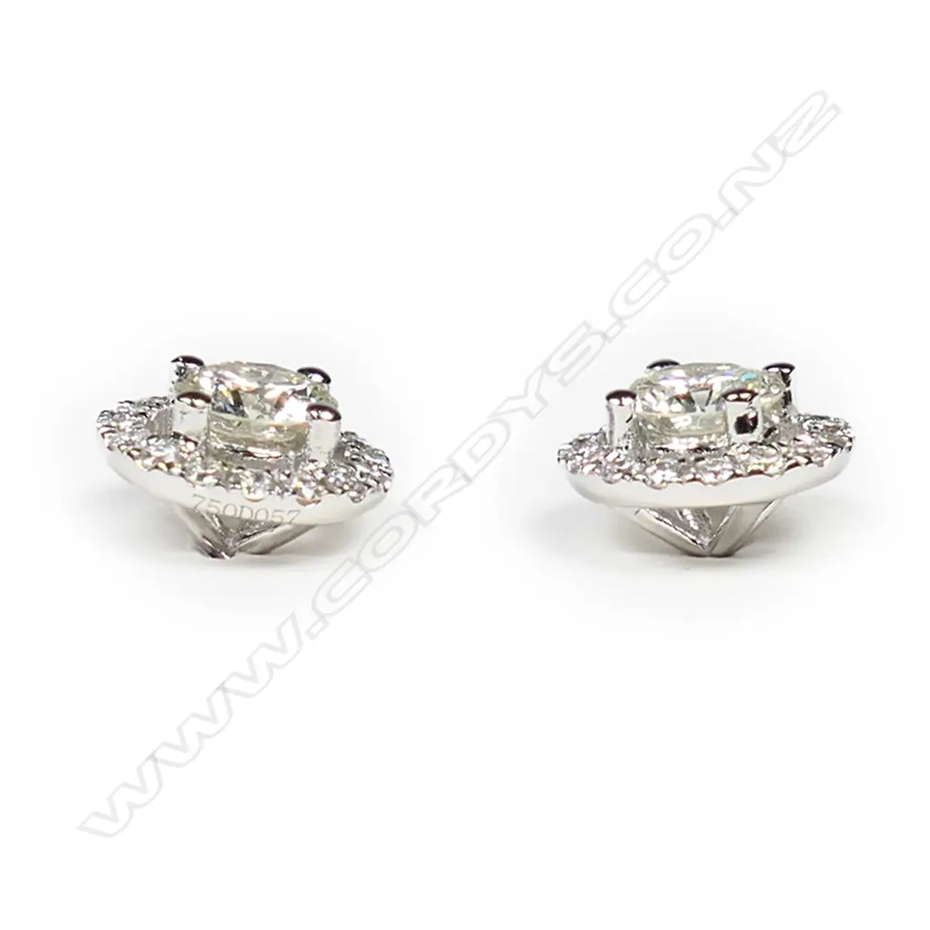 pair of 18ct white gold and diamond cluster earrings. Image 1++