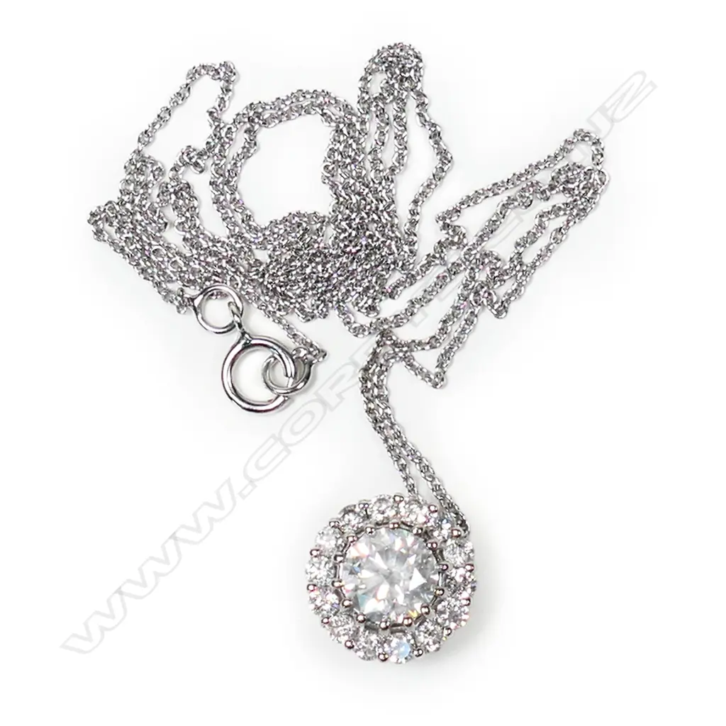 A 14ct white gold and diamond halo pendant necklace, Image 1++