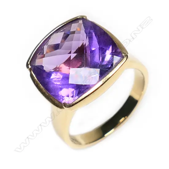 An 18ct gold and amethyst dress ring,