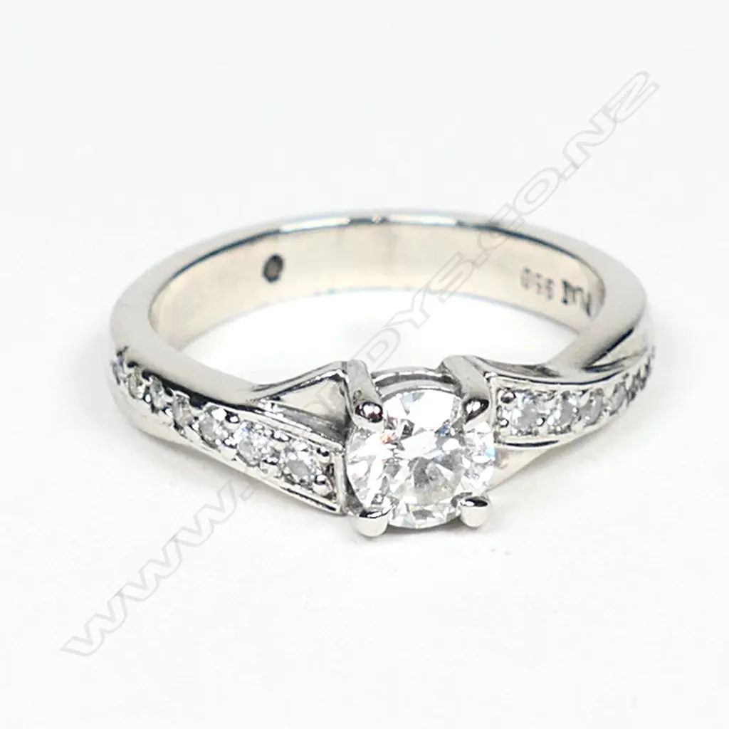 A modern platinum and diamond solitaire ring, Image 1++