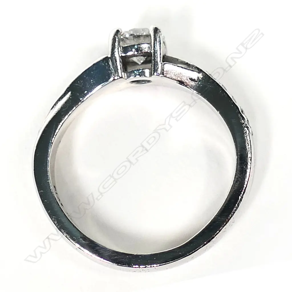 A modern platinum and diamond solitaire ring, Image 1++