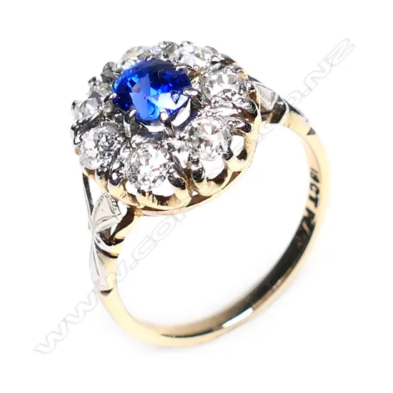 An estate sapphire and diamond cluster ring,
