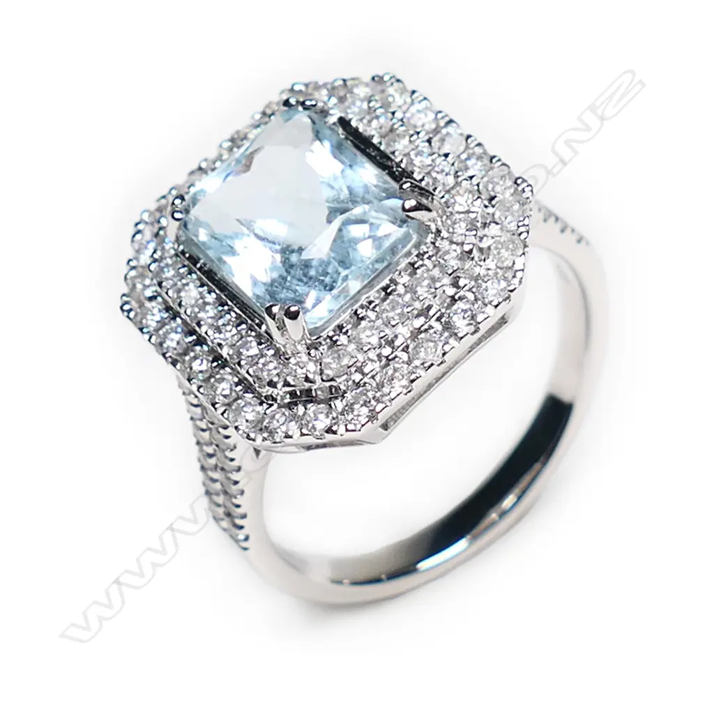 A 14ct white gold, aquamarine and diamond double halo ring, Image 1++