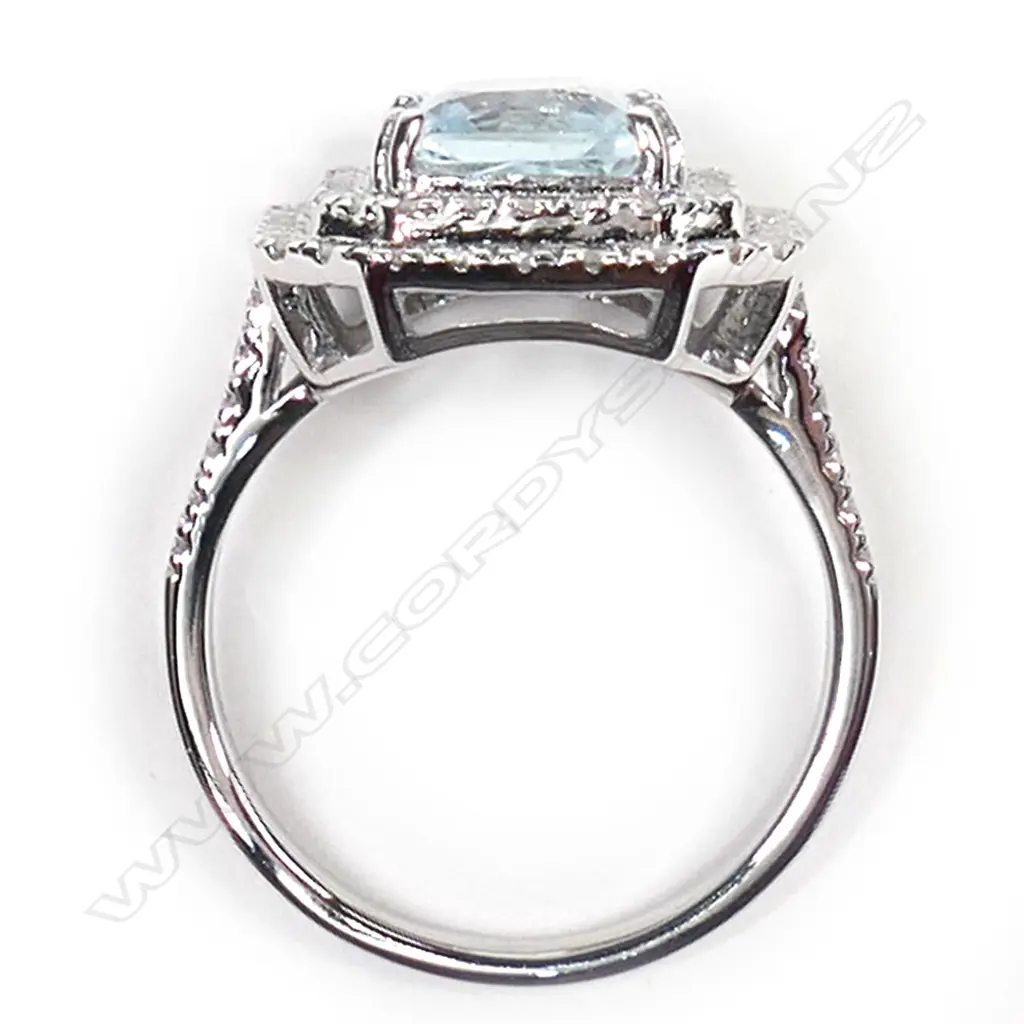 A 14ct white gold, aquamarine and diamond double halo ring, Image 1++