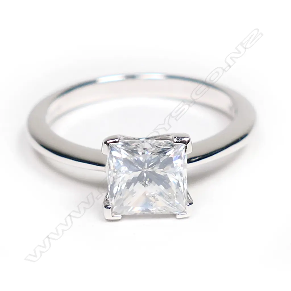 A 14ct white gold and diamond solitaire ring, Image 1++