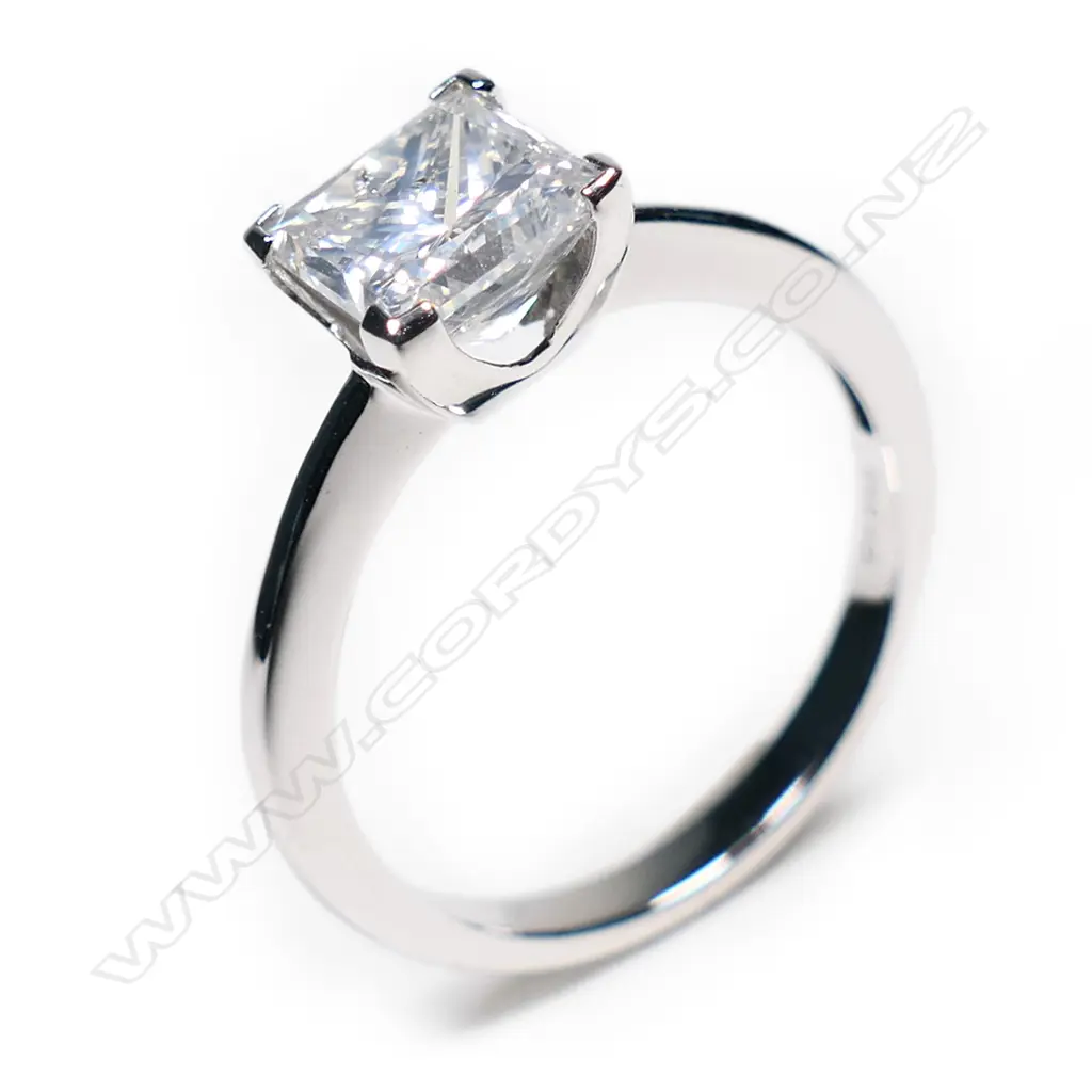 A 14ct white gold and diamond solitaire ring, Image 1++
