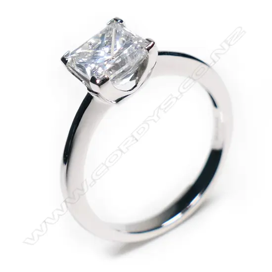 A 14ct white gold and diamond solitaire ring,