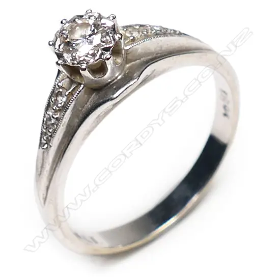 An 18ct white gold and palladium, estate diamond ring,