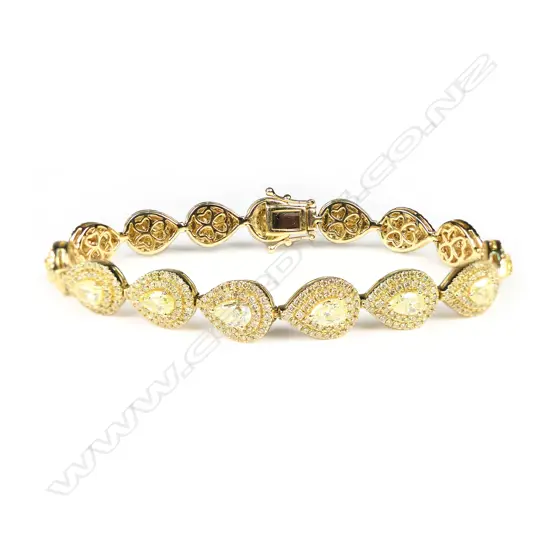 An 18ct yellow gold and yellow diamond multi cluster bracelet,