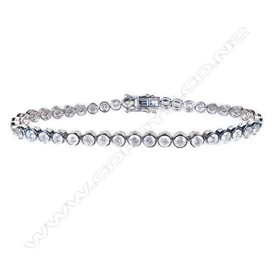 A 14ct white gold and diamond tennis bracelet