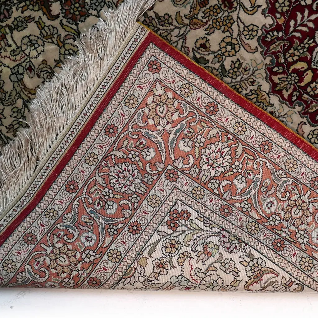 An all silk Hereke carpet Image 1++