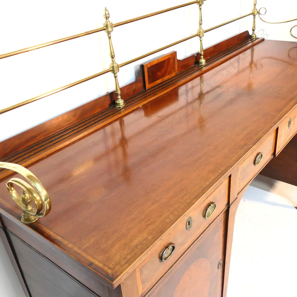 A George III crossbanded mahogany Sheraton sideboard with elegant brass gallery back, Image 1++