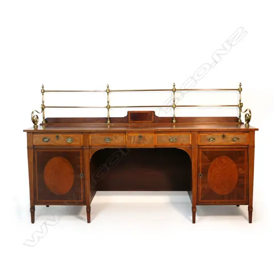 A George III crossbanded mahogany Sheraton sideboard with elegant brass gallery back,