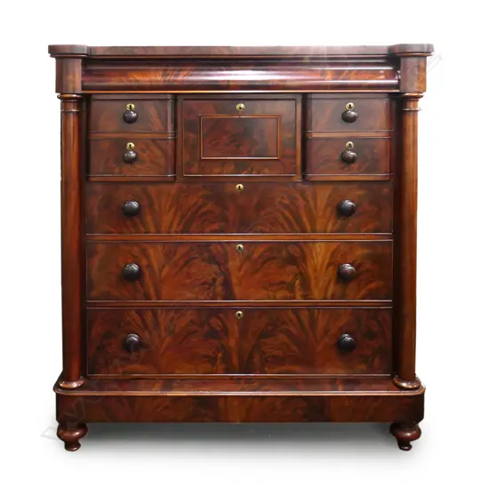 An impressive Victorian flame mahogany scotch chest,