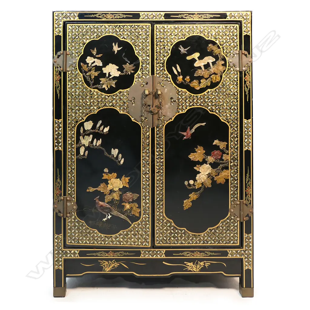 A vintage oriental black lacquer small cupboard with carved coloured stone decoration, Image 1++