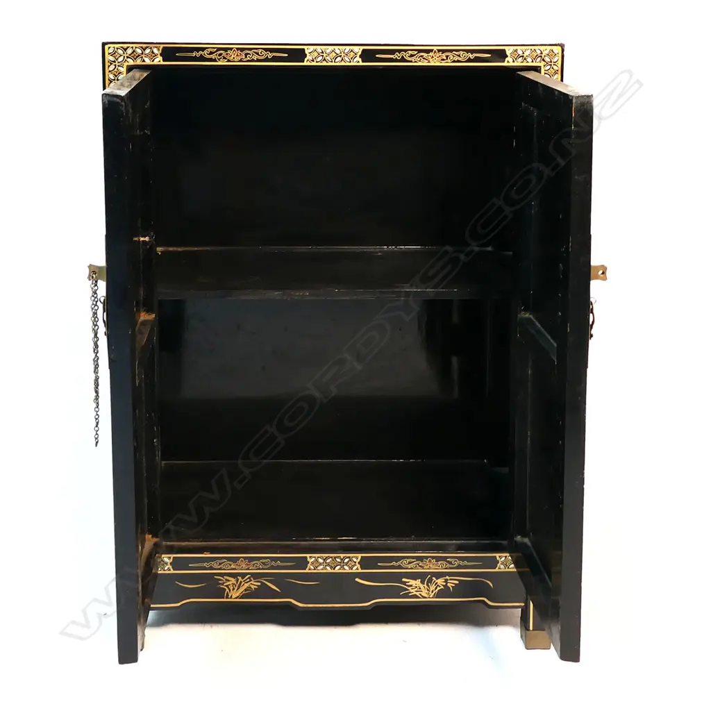 A vintage oriental black lacquer small cupboard with carved coloured stone decoration, Image 1++
