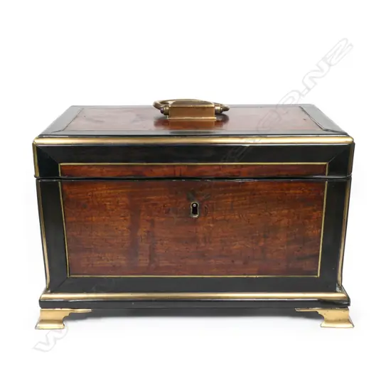 An ebony crossbanded mahogany tea caddy, with brass stringing and clashed edges,