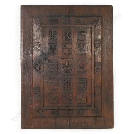 An oak panel carved with shields of the 30 French knights from the 'Combat des Trente',