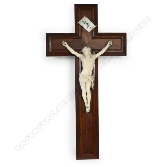 A vintage wood and ivory crucifix,