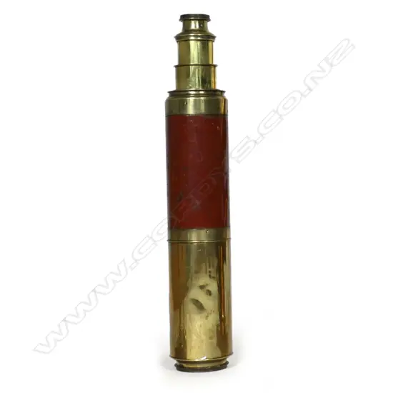 A late 18thC brass three draw telescope engraved 'Ramsden, London Day or Night', with red painted mahogany barrel, and protective lens covers at each end and extendable sunshade. Extended L.820mm.