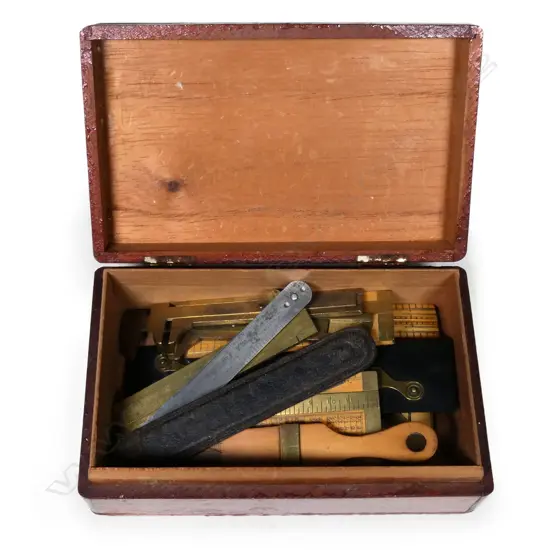 A collection of eleven various rules, scales and gauges,