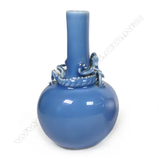 A Chinese monochrome lavender blue glazed bottle vase, with chilong, 19th/20thC,