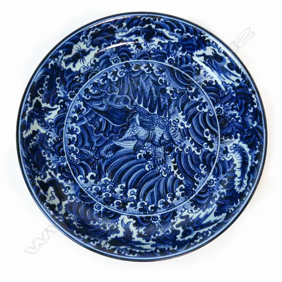 A large Chinese blue and white porcelain charger,