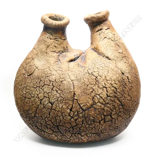 A Len Castle hand formed stoneware twin aperture flask vase, umber pigmented,