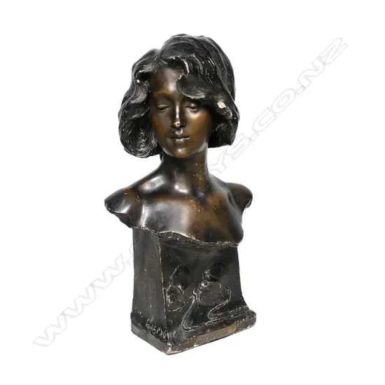 A French Art Nouveau pottery bust of a young woman, titled ‘Coquelicot', signed 'Gaseau',