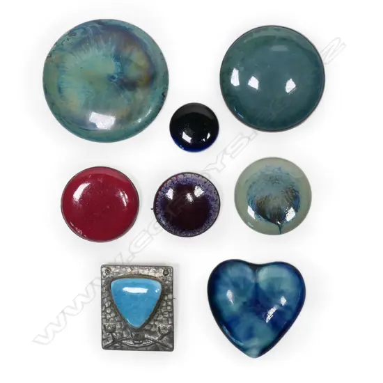 Eight Ruskin Pottery plaques,