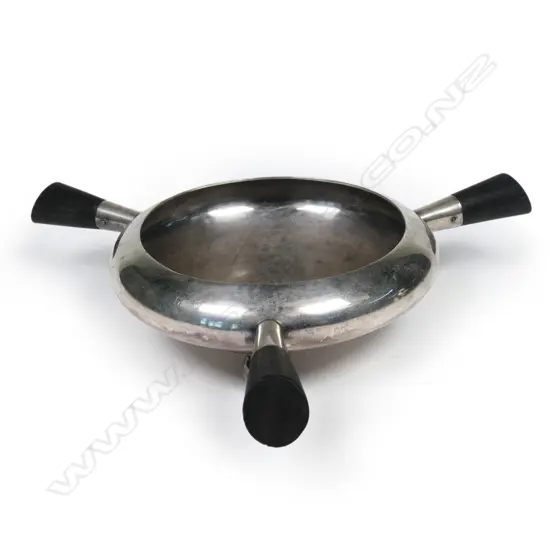 A Thomas Latham & Ernest Morton silver plated and ebony handled sugar bowl, designed by Christopher Dresser,