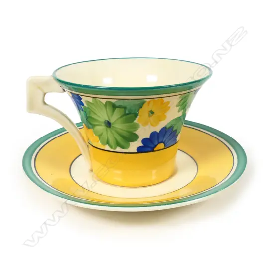 A Clarice Cliff hand painted 'Bizarre' cup and saucer, in the Sungay pattern,