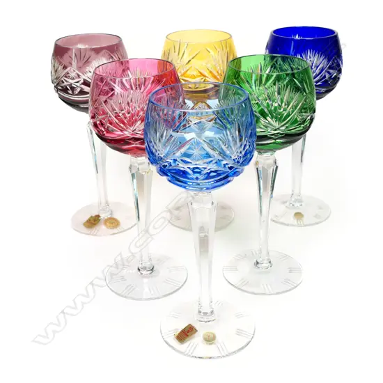 A harlequin set of six Bohemian wine glasses.
