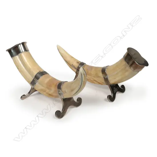 A pair of unusual silver plate mounted hippo tusk carver rests, by Mappin & Webb,