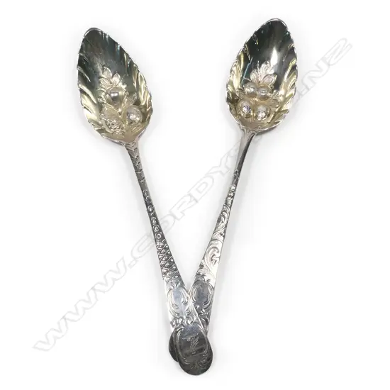 Two Georgian Scottish silver berry spoons,