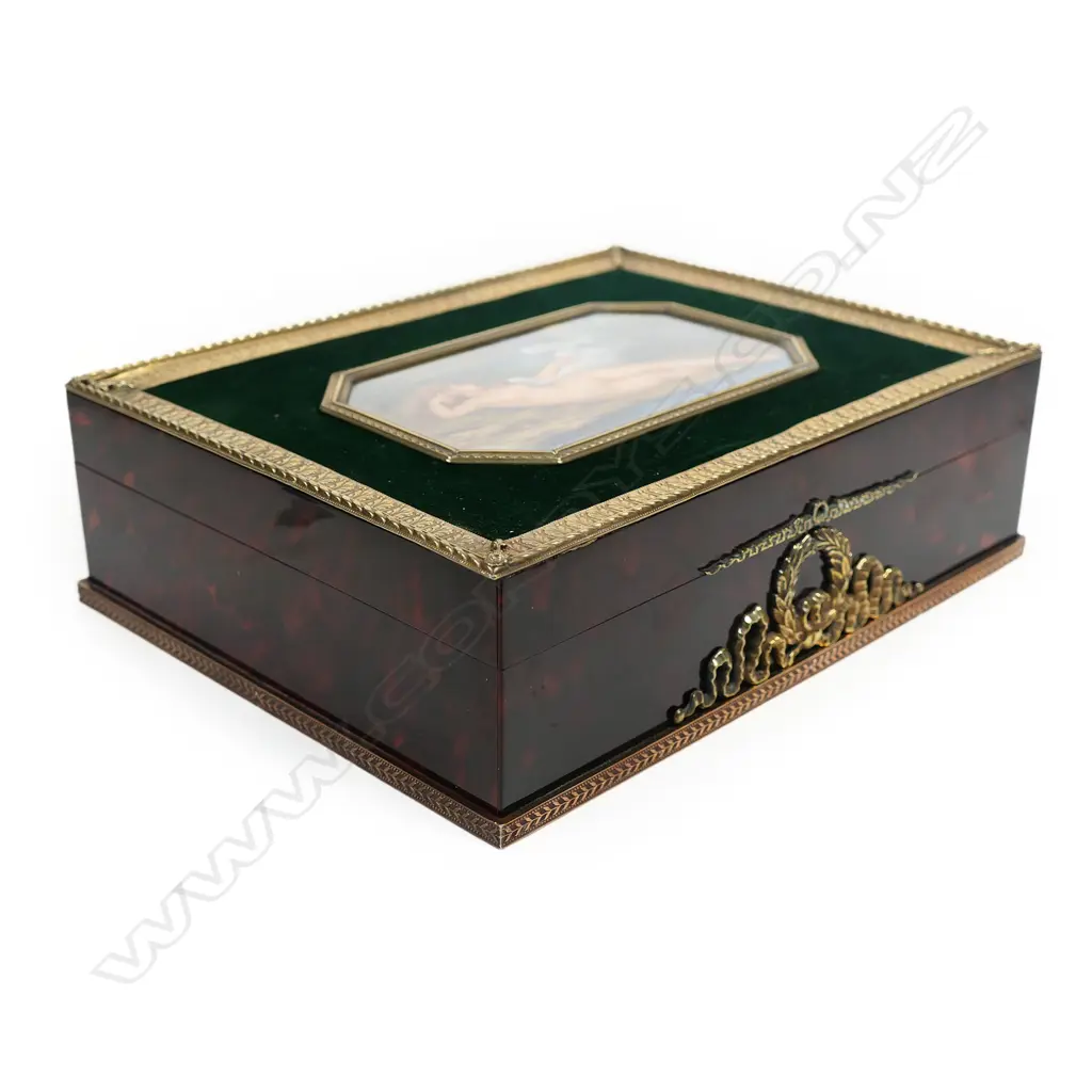 An Asprey’s, London lidded box, with painted ivory panel to the top depicting Leda and the Swan. Image 1++