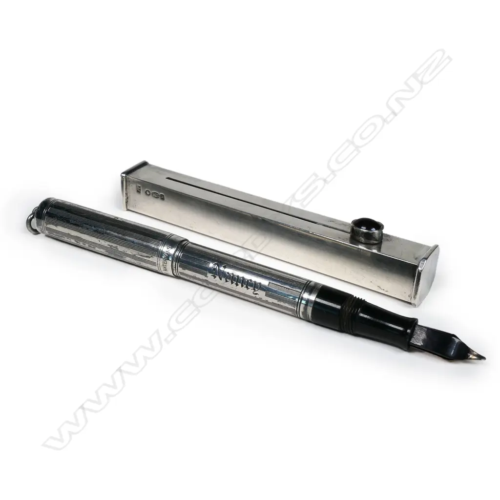 A lady's Waterman's silver fountain pen and a silver sealing wax holder; Image 1++