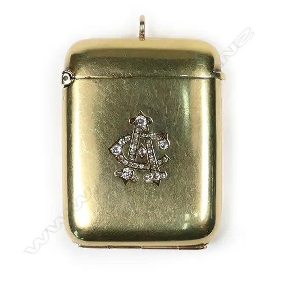 An uncommon Edwardian 15ct gold and diamond set locket vesta,