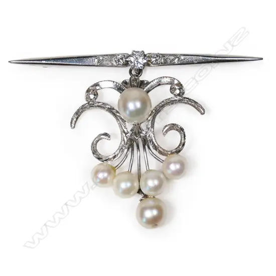 A vintage 14ct white gold, diamond and pearl suspended brooch,