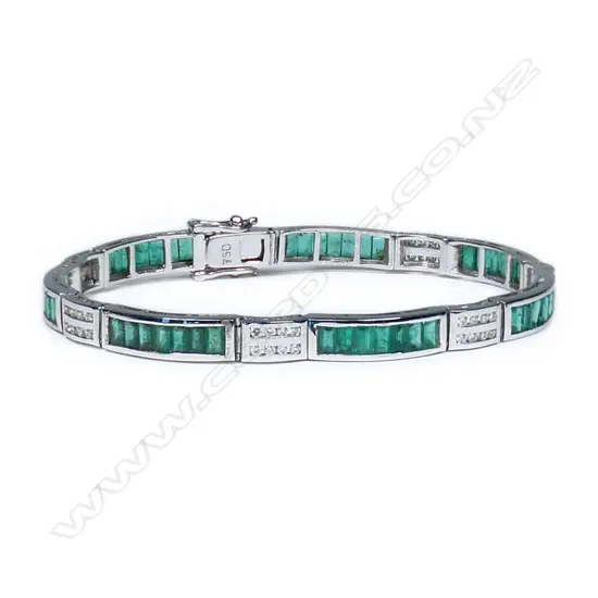 An 18ct white gold, emerald and diamond bracelet,