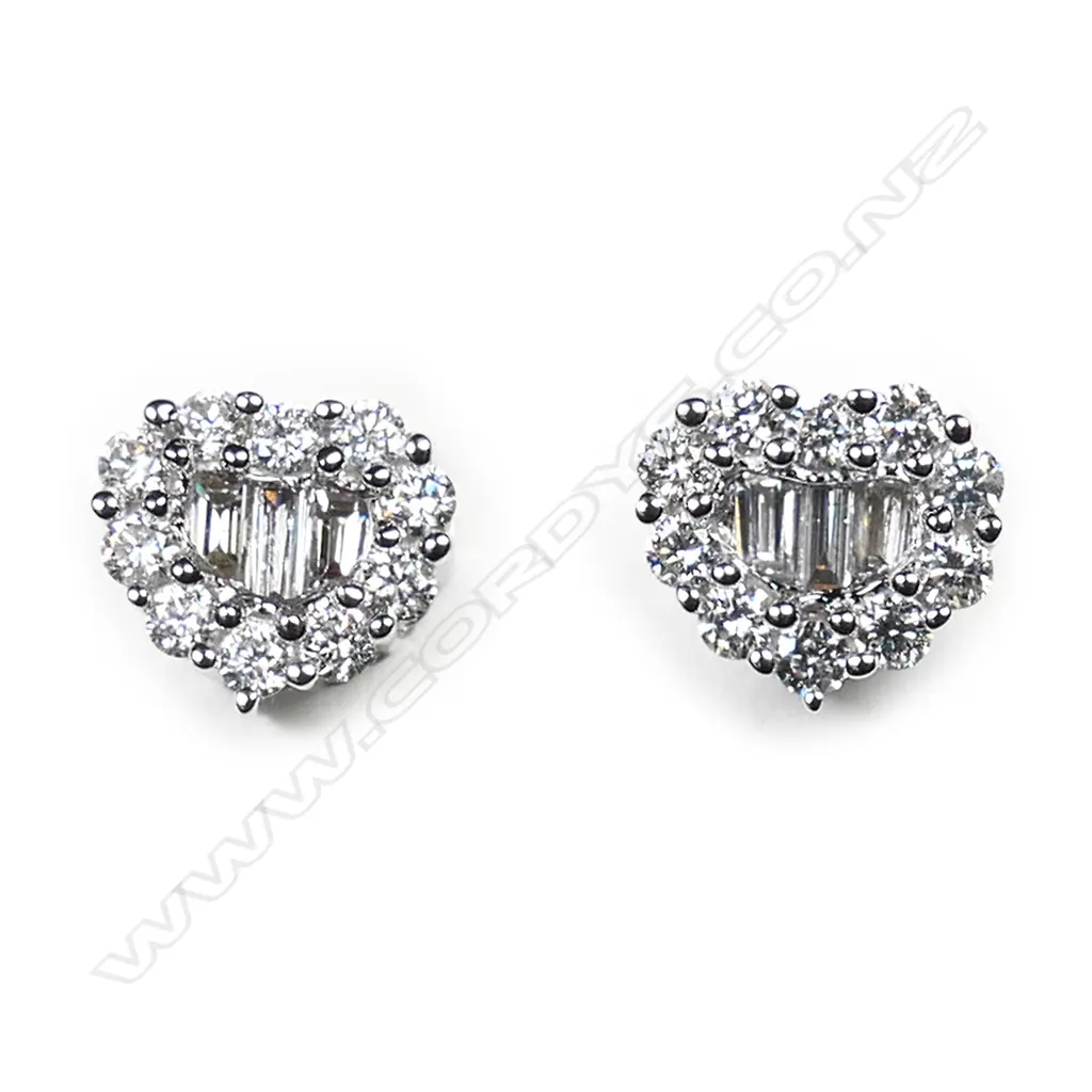 A pair of 18ct white gold and diamond cluster earrings, Image 1++