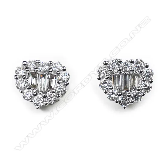 A pair of 18ct white gold and diamond cluster earrings,