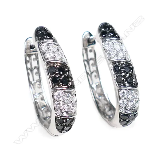 A pair of 14ct white gold and diamond hinged hoop earrings,